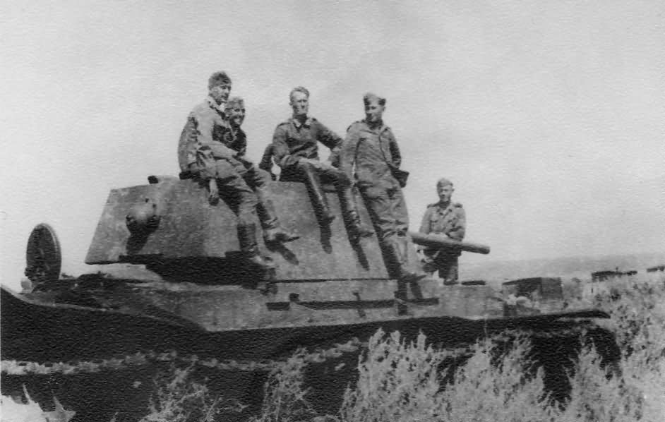 German troops inspect heavy tank KV-1 model 1941