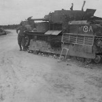 T-28. German troops of the 12. Panzer-Division have painted their insignia on the tank as a road sign for the location of their encampment.