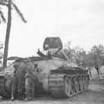 Abandoned T-34 tank on road