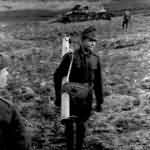 Soldier with Panzerschreck and destroyed T-34 tank