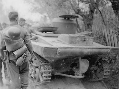 Wehrmacht Infantry passing T-37A