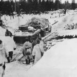 Finnish Troops tow away a captured T-37A