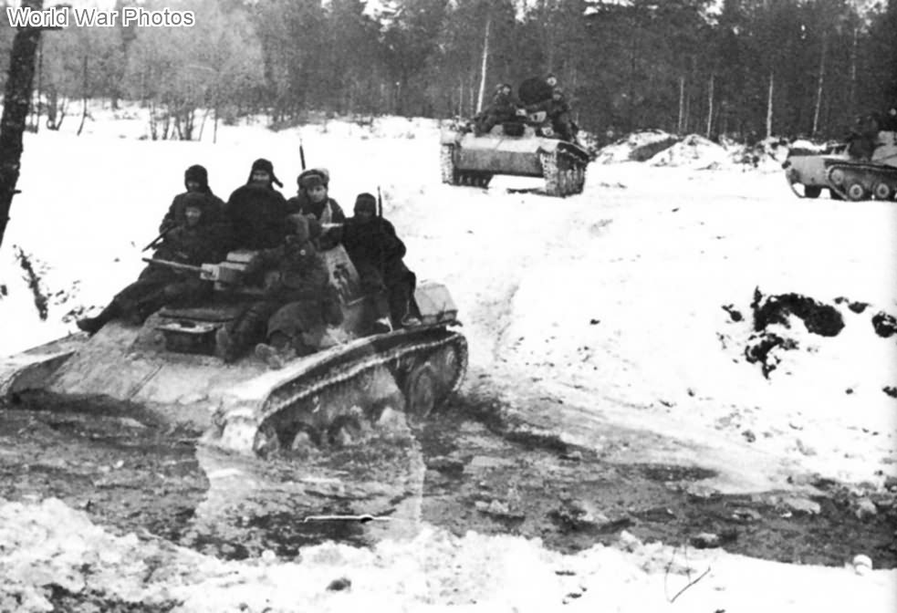 Russian troops riding on the T-60 tank