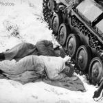 Tank crew sleep near their T-70